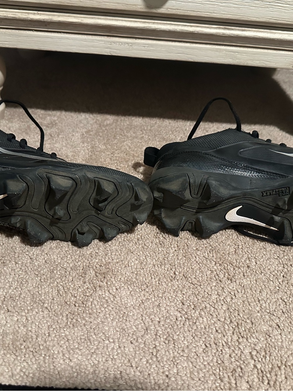 Nike Men's Black Baseball Cleats with White Swoosh